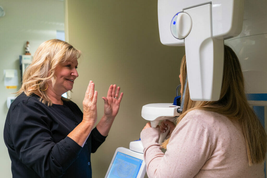 guiding patient getting dental xray