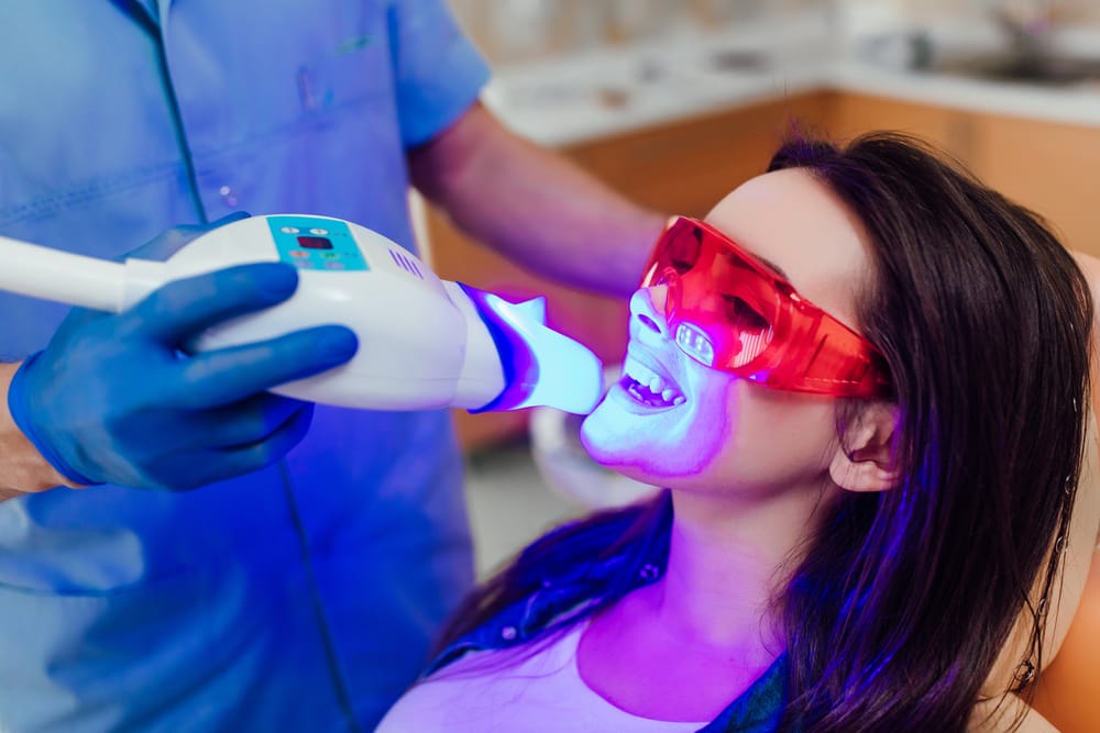 woman getting teeth whitened