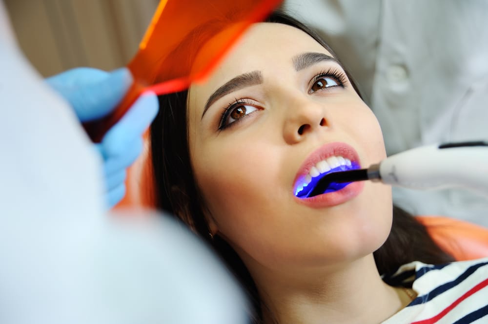 woman getting tooth filling